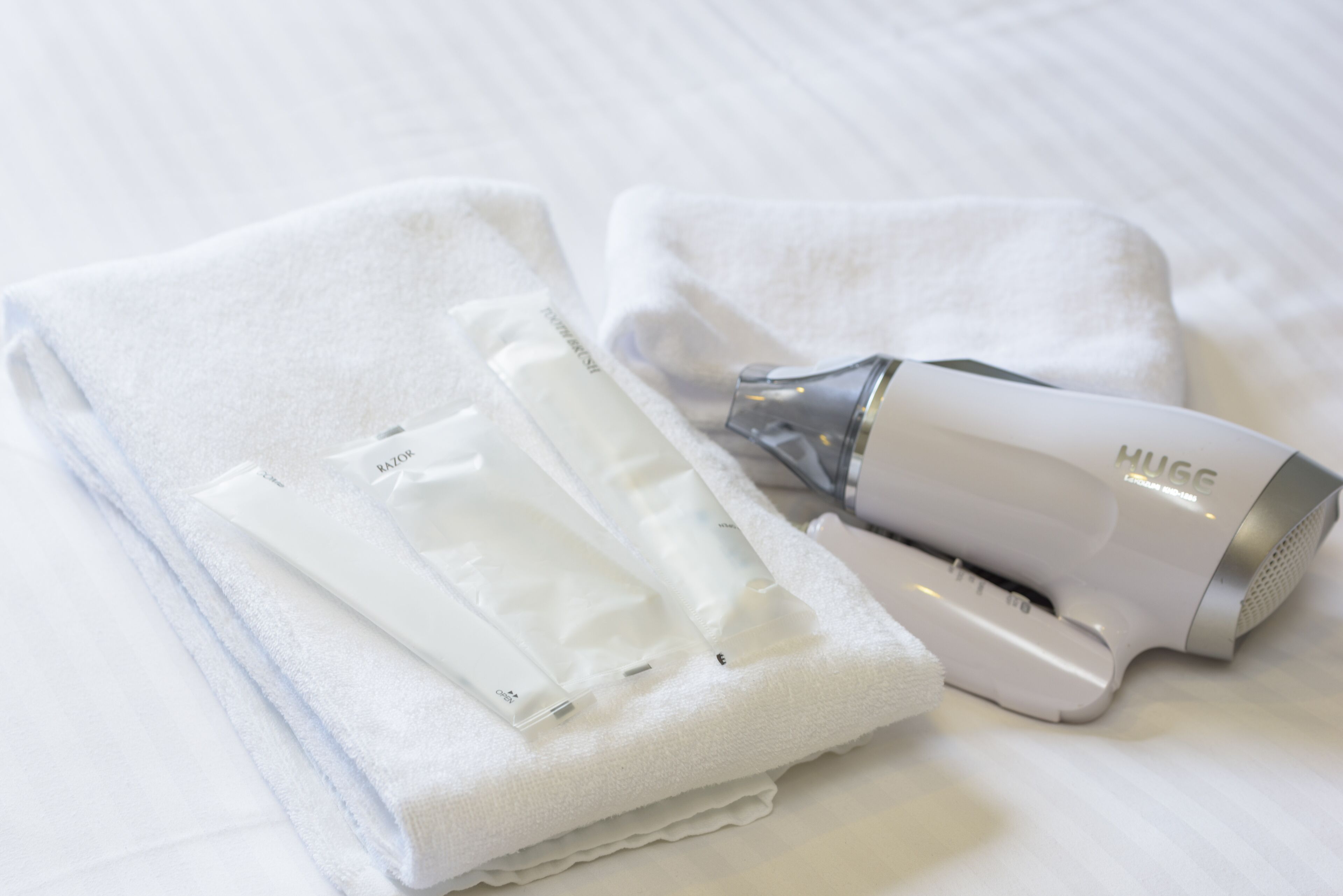 free toiletries, hair dryer, slippers, bidet