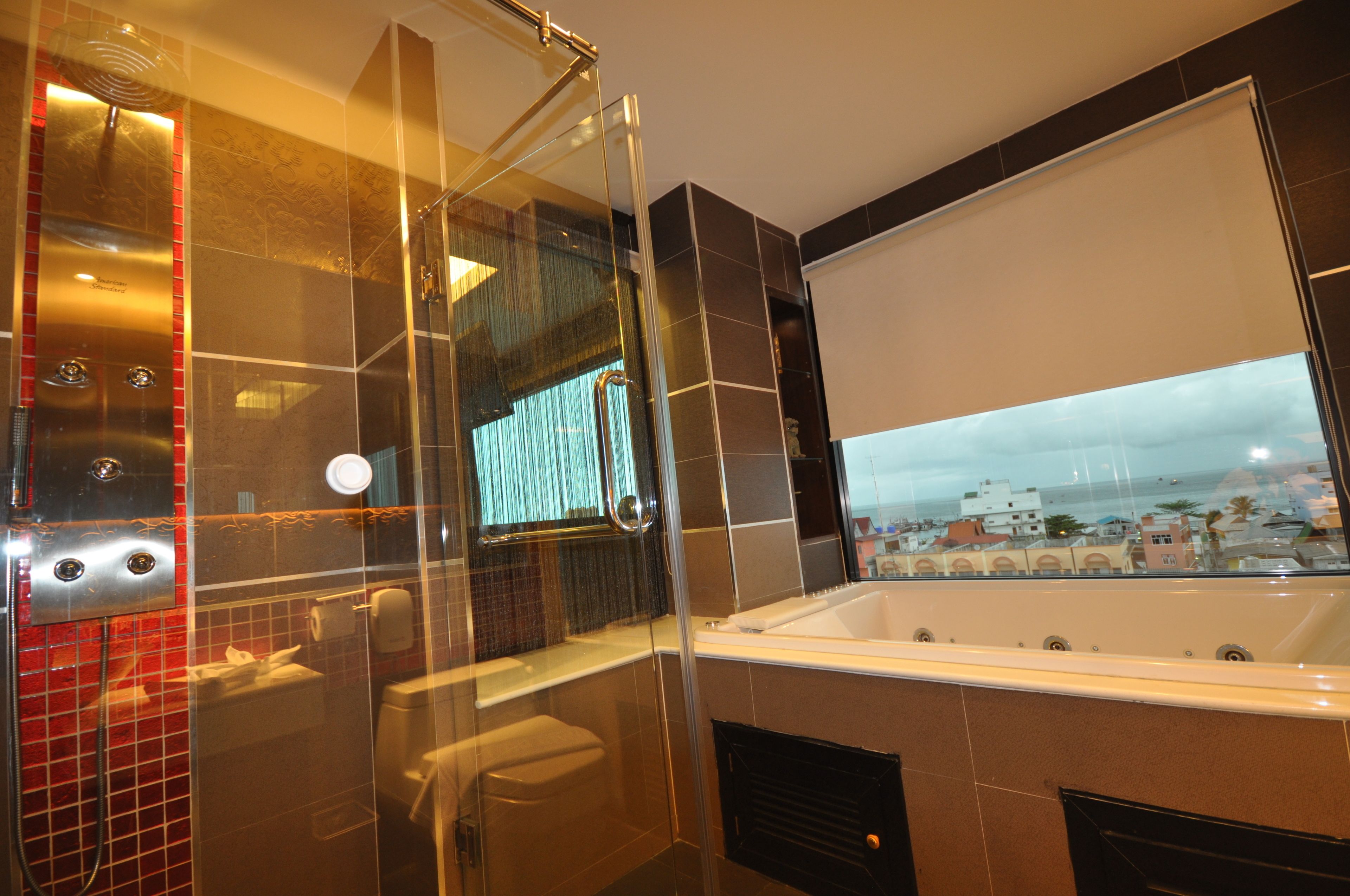 premier suite | bathroom | rainfall showerhead, free toiletries, hair dryer, towels