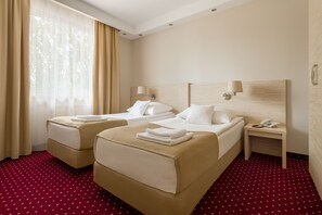 Blackout drapes, iron/ironing board, travel crib, free WiFi