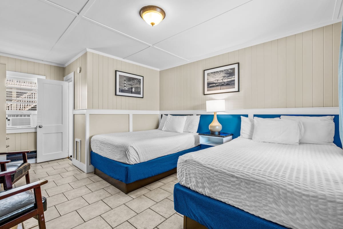 Standard Room, 2 Double Beds, Courtyard View | Free WiFi, bed sheets