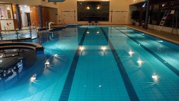 Relax by the pool with a clear view of the surrounding area.