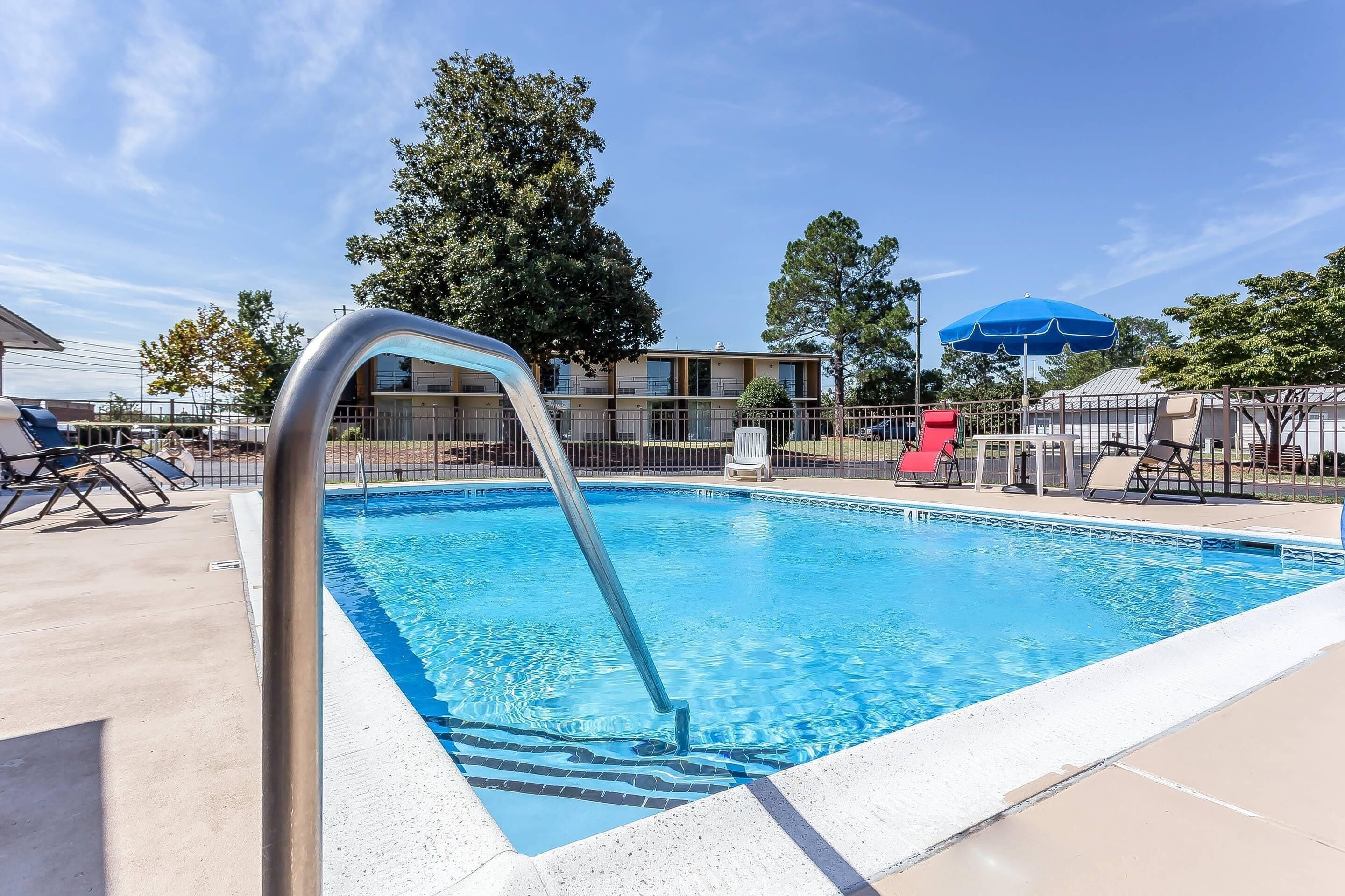 Seasonal outdoor pool, pool umbrellas, sun loungers