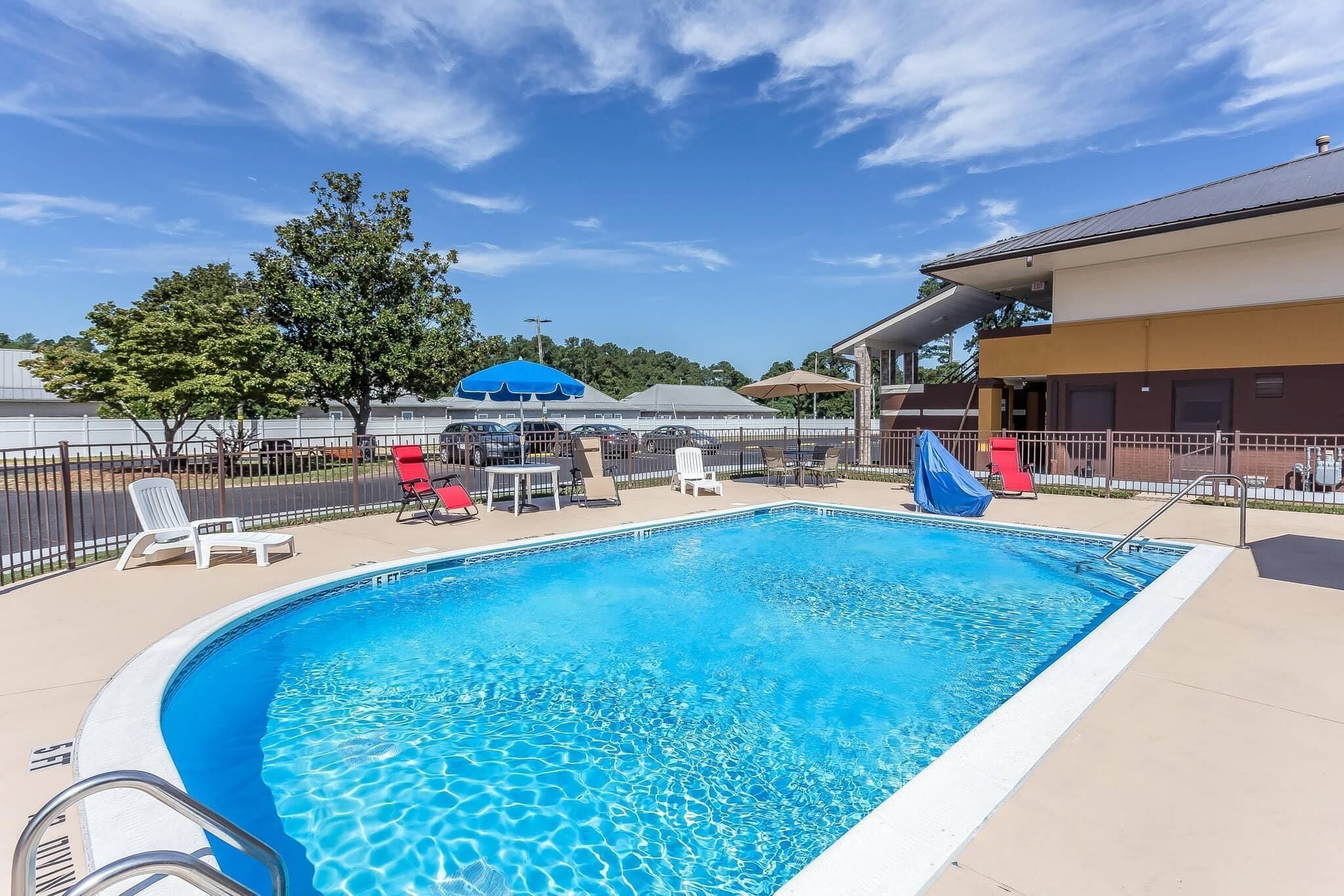 Seasonal outdoor pool, pool umbrellas, pool loungers