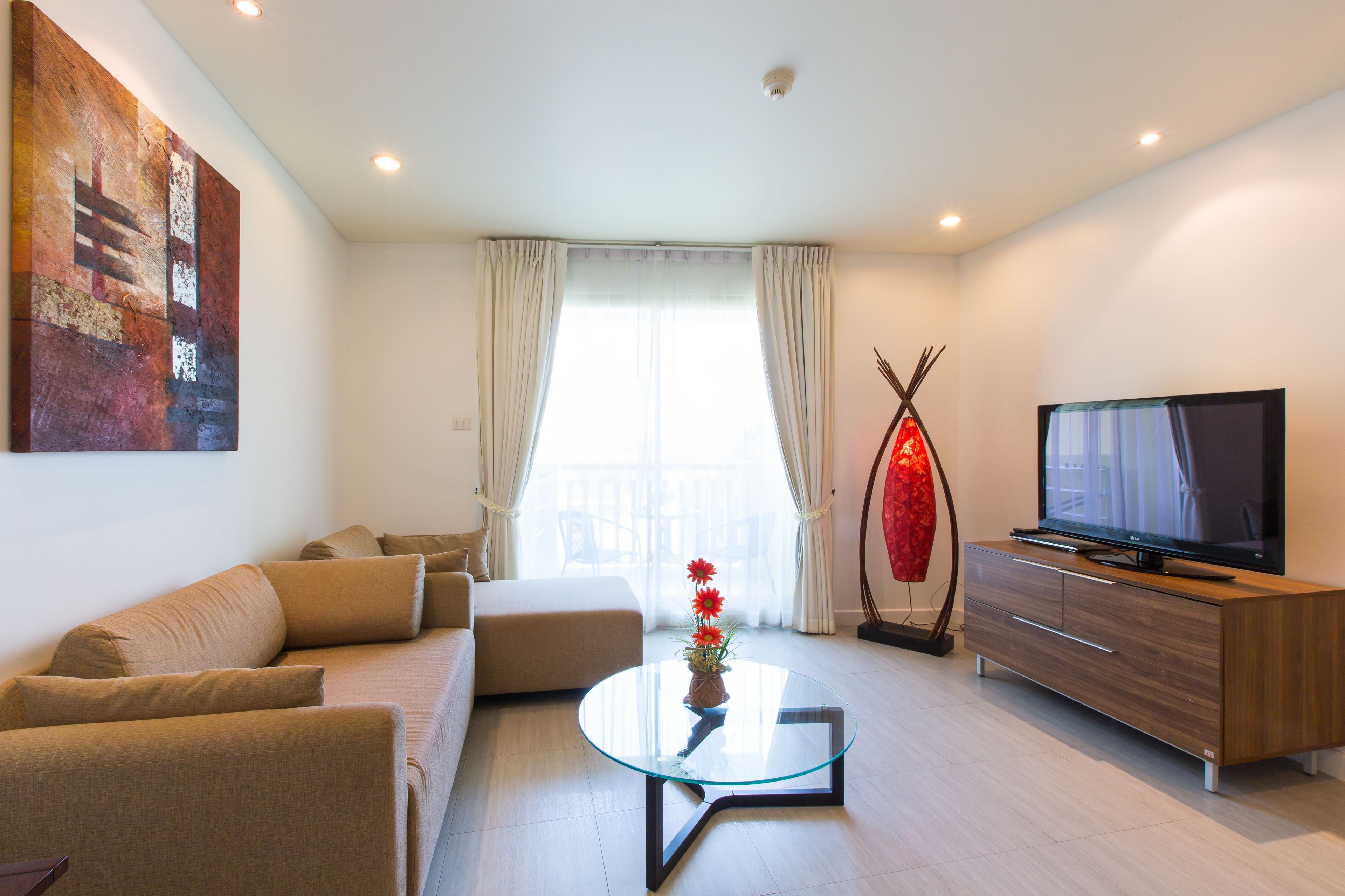 Classic Apartment, 1 Bedroom, Pool View, Poolside | Living area | Flat-screen TV, DVD player