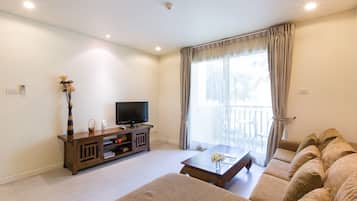 Comfort Apartment, 1 Bedroom, Pool View, Poolside | Living area | Flat-screen TV, DVD player
