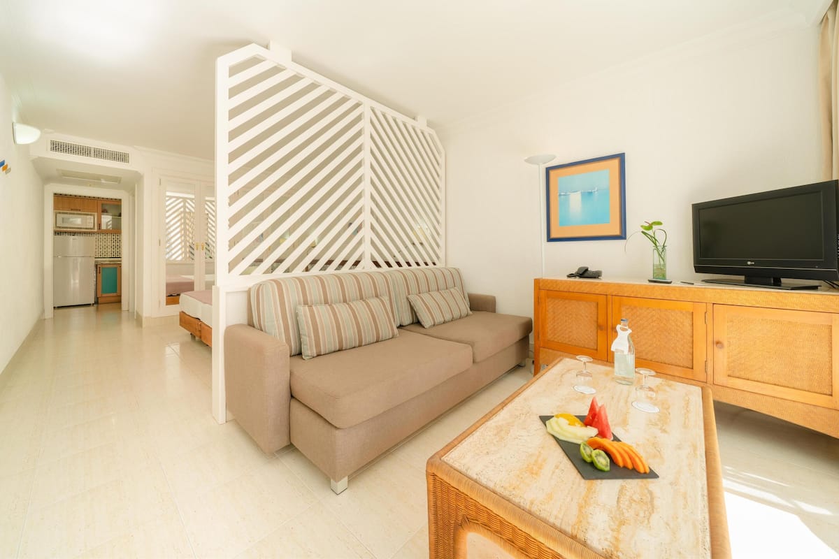 Studio with garden view, terrace (2 adults) | 2 bedrooms, in-room safe, travel crib, free WiFi