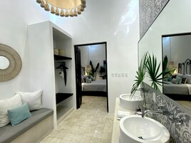 Suite, 1 King Bed (CAPITAL) | Bathroom | Shower, rainfall showerhead, designer toiletries, hair dryer