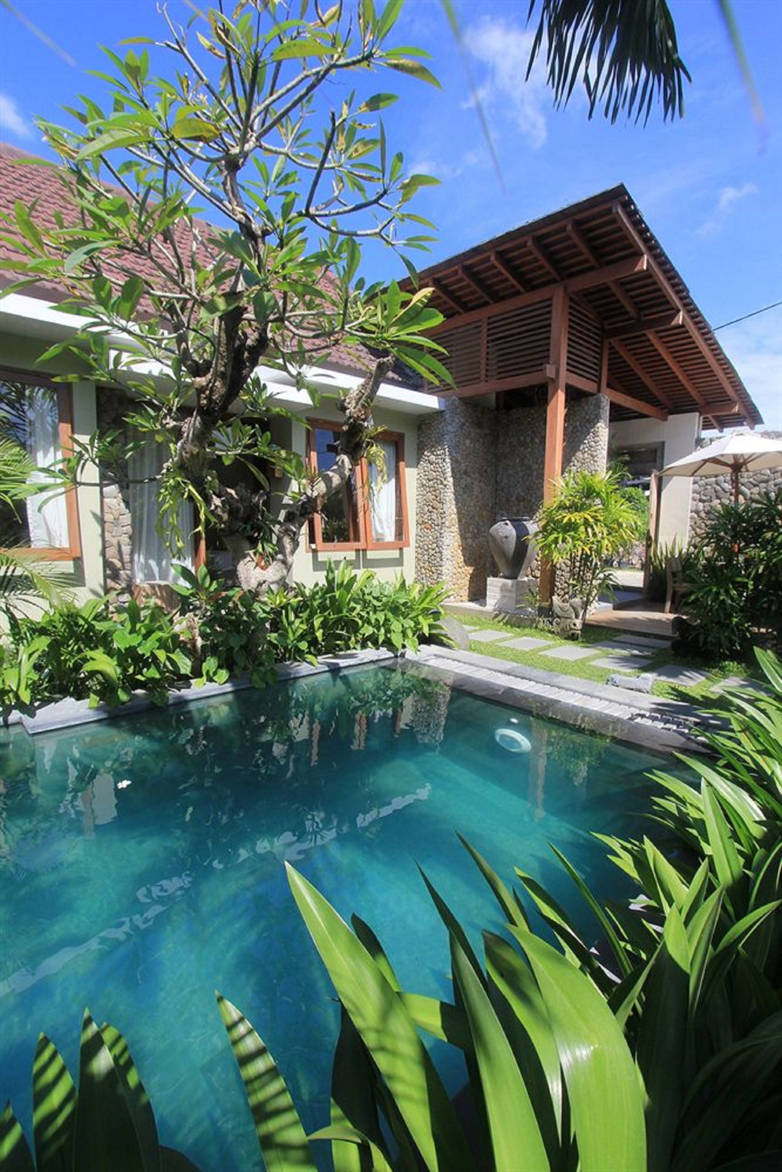 outdoor pool, pool umbrellas, pool loungers