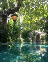 Outdoor pool, pool umbrellas, sun loungers