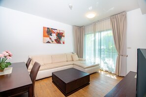 2 Bedrooms Apartment on 1st Floor | Living area | 42-inch flat-screen TV with cable channels, TV - Baan Sandao Beach Apartment (Hua Hin)
