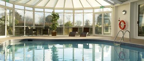 Indoor pool, open 7:00 AM to 9:00 PM, sun loungers