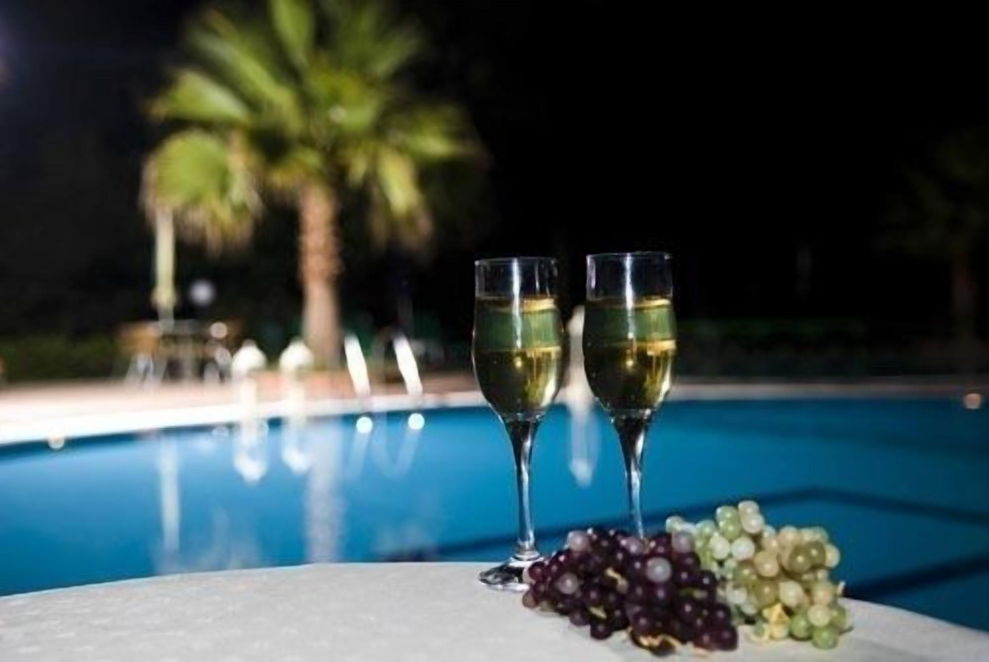 Seasonal outdoor pool, pool umbrellas, sun loungers