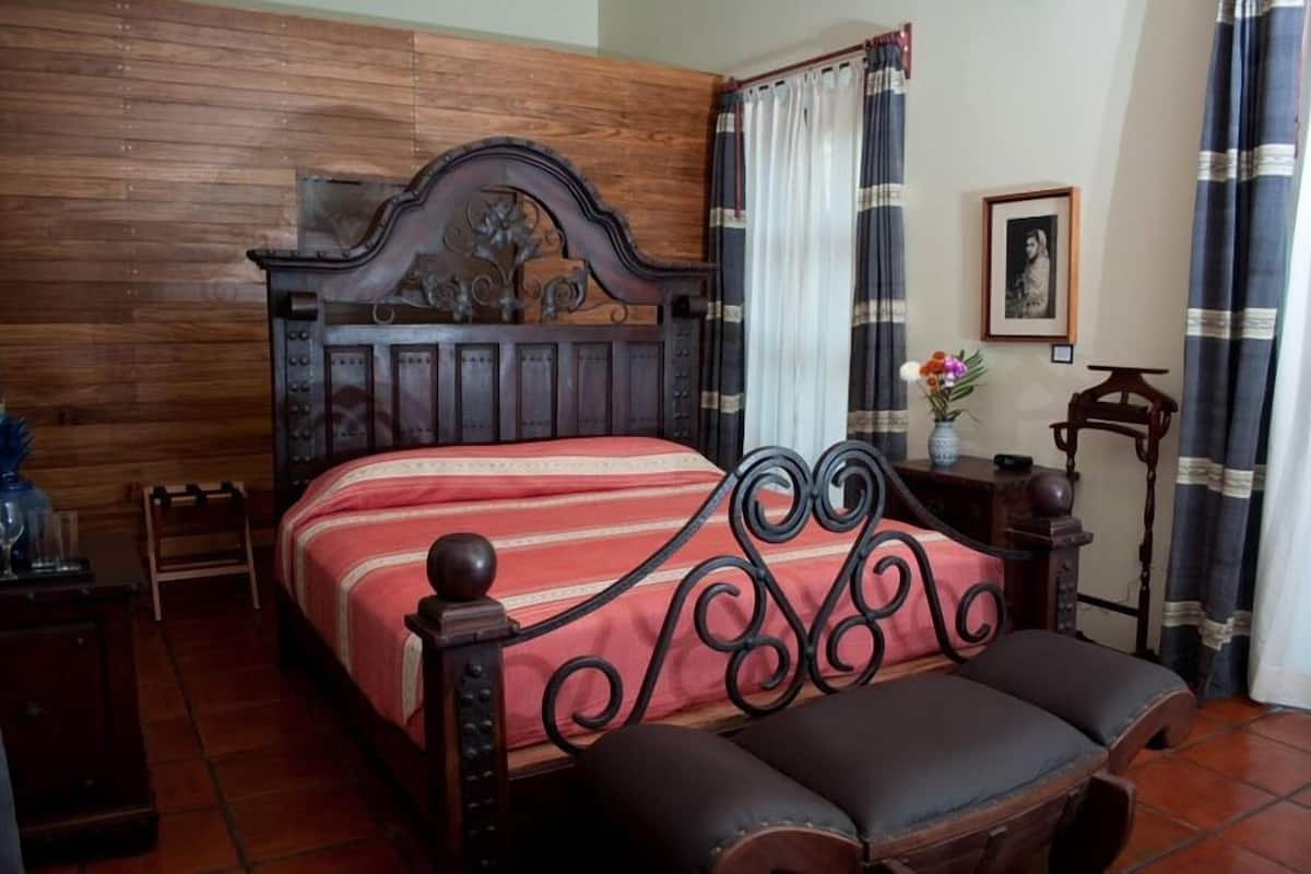 Egyptian cotton sheets, down duvets, in-room safe