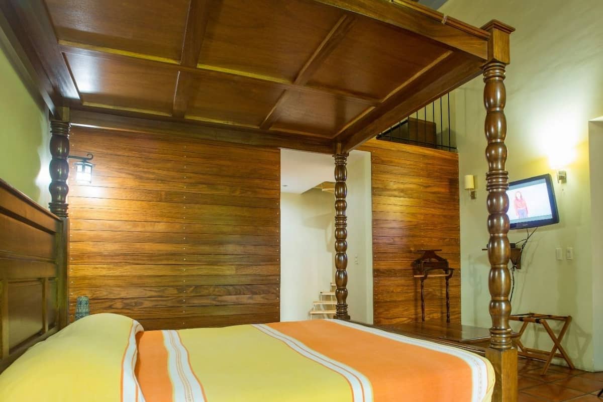 Egyptian cotton sheets, down duvets, in-room safe