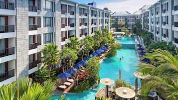 Outdoor pool, free cabanas, pool umbrellas