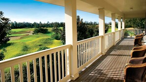 A covered porch with a view of a golf course. - Club Wyndham Dye Villas (North Myrtle Beach)