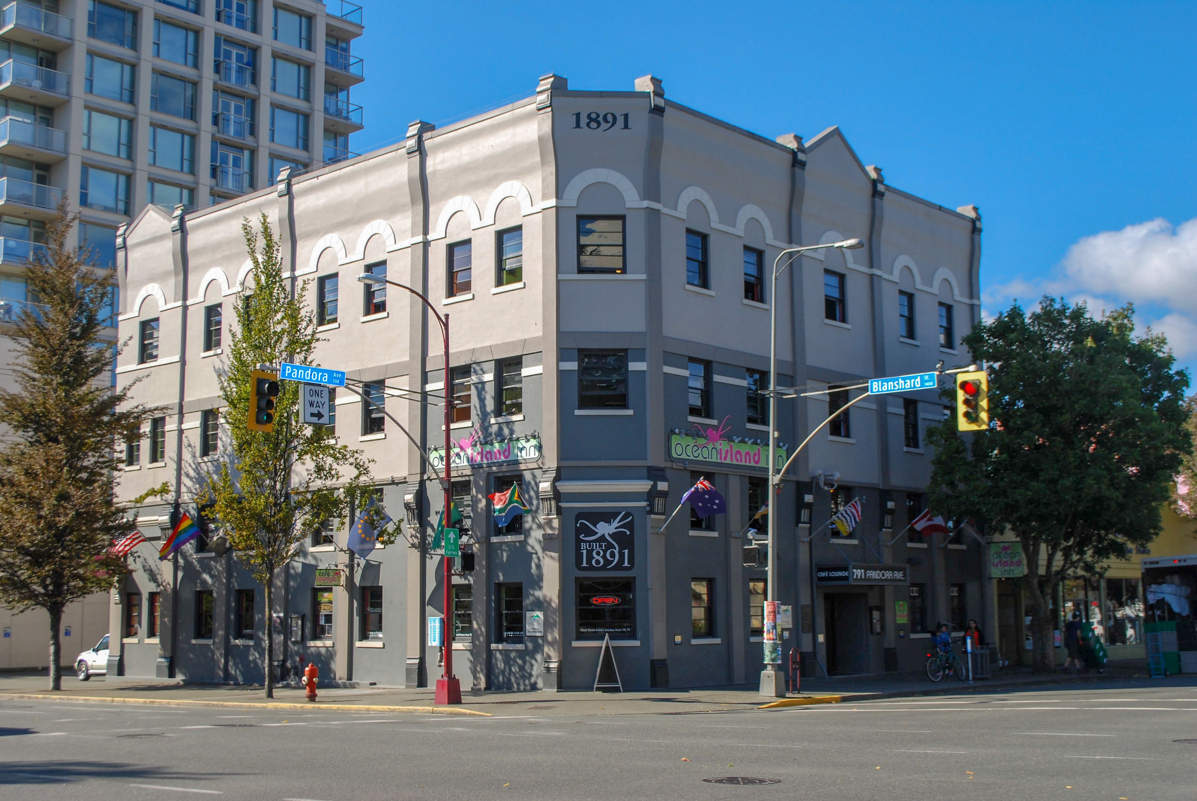 A historic building with a '1891' sign, located at the corner of Blanshard and Oceanview streets.