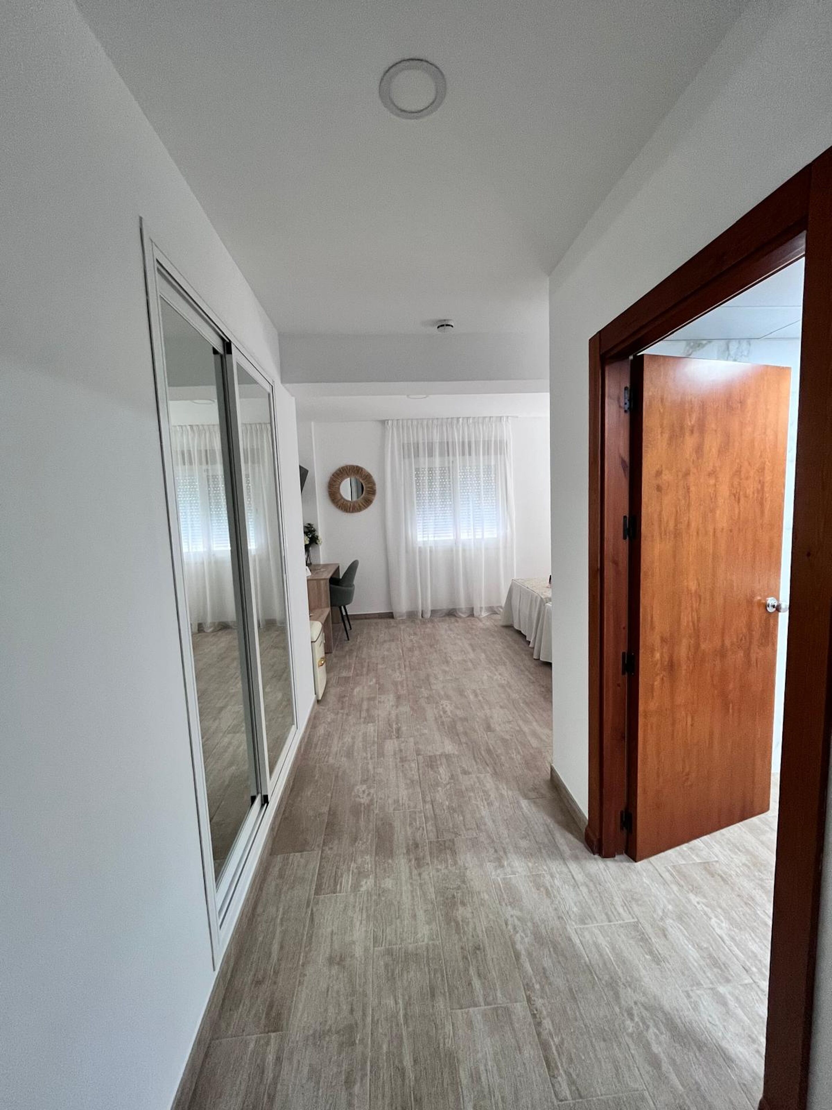 accessible twin room for guests with disabilities | in-room safe, desk, laptop workspace, free wifi