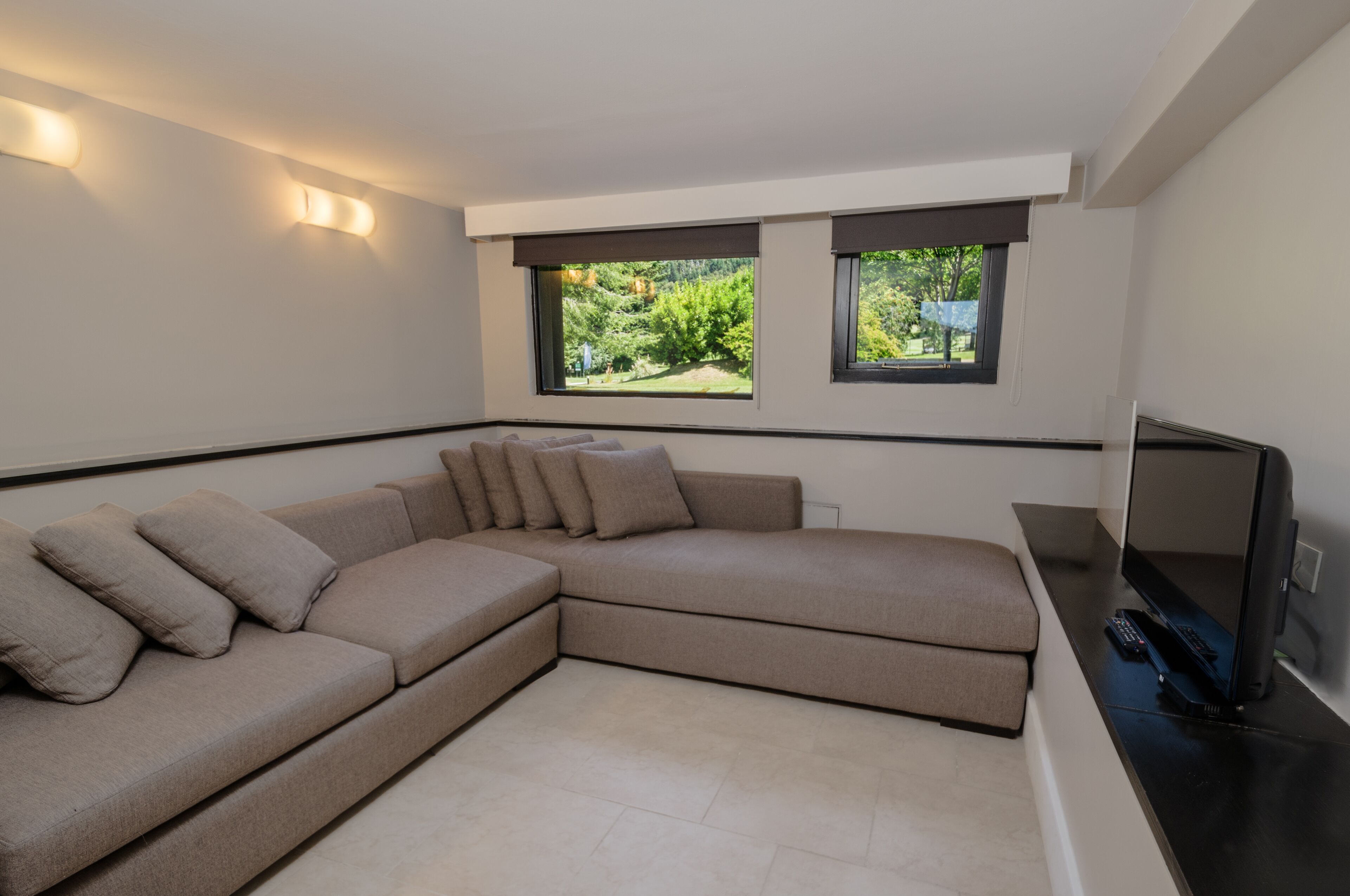 junior suite, 1 king bed with sofa bed | living room | 32-inch lcd tv with satellite channels, tv, pay films