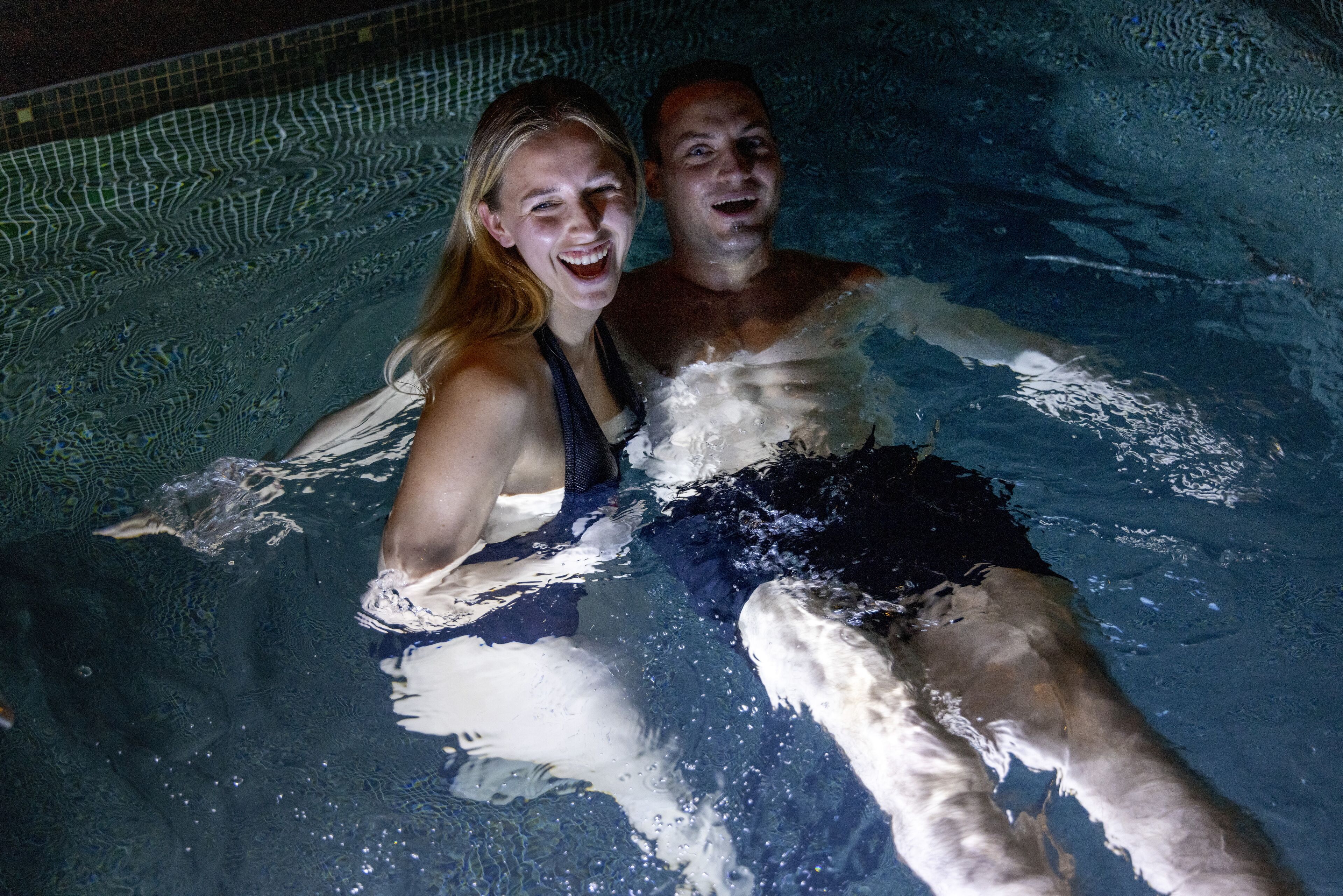 A swimming pool with clear water and visible pool edges.