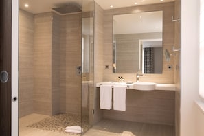 Shower, rainfall showerhead, designer toiletries, hair dryer