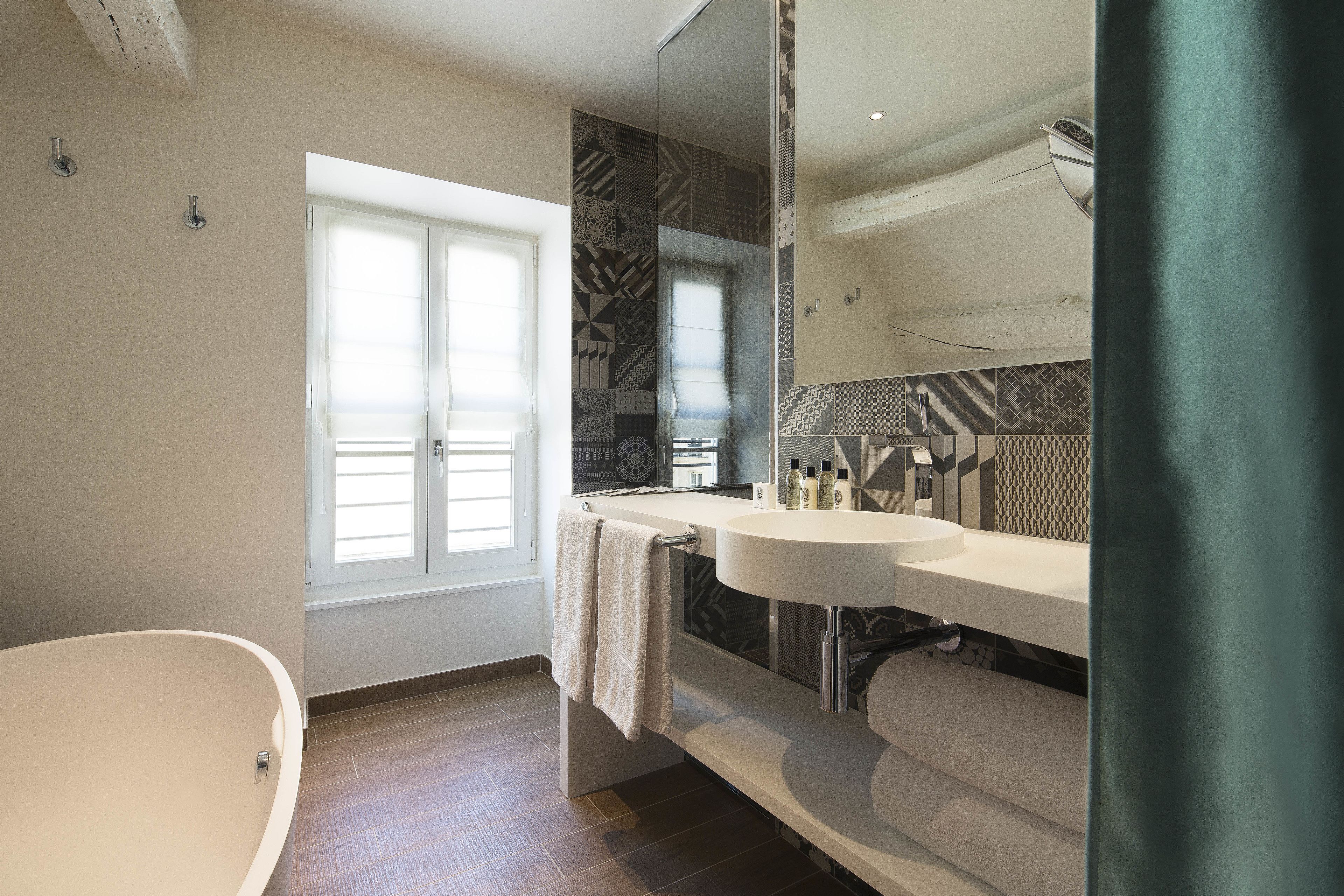 shower, rainfall showerhead, designer toiletries, hair dryer