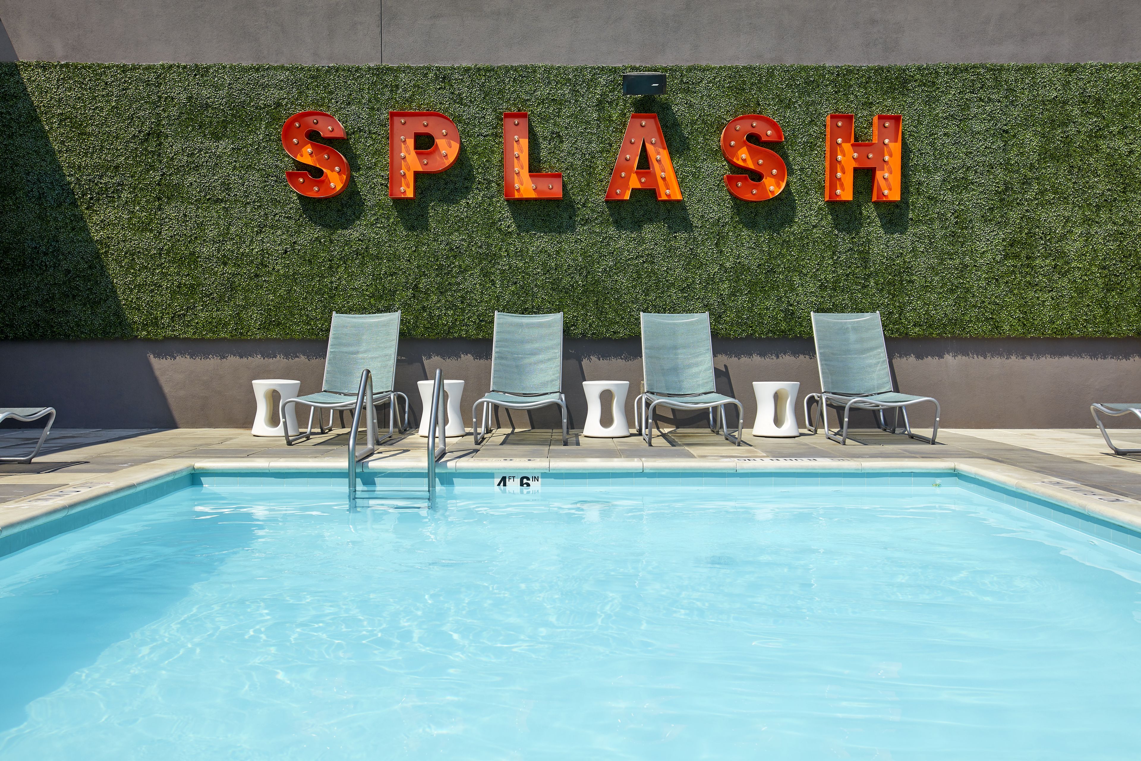 outdoor pool, pool umbrellas, pool loungers