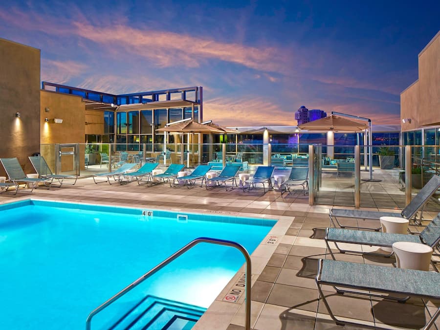 Outdoor pool, pool umbrellas, pool loungers