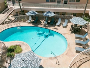 Outdoor pool, pool umbrellas, sun loungers