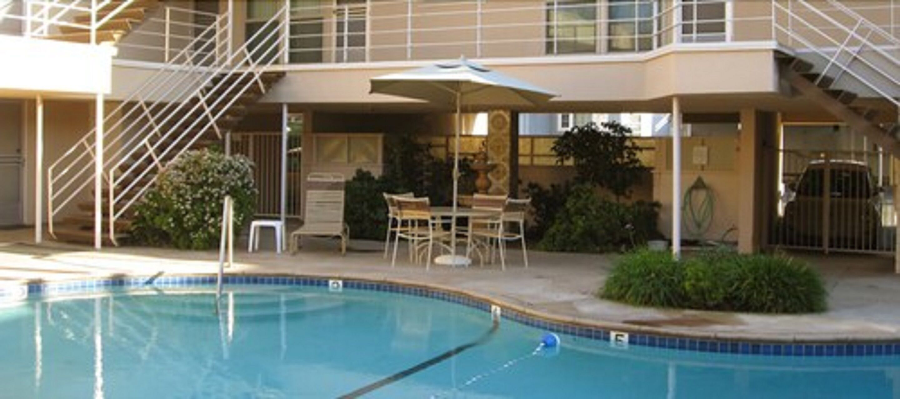 outdoor pool, pool umbrellas, pool loungers