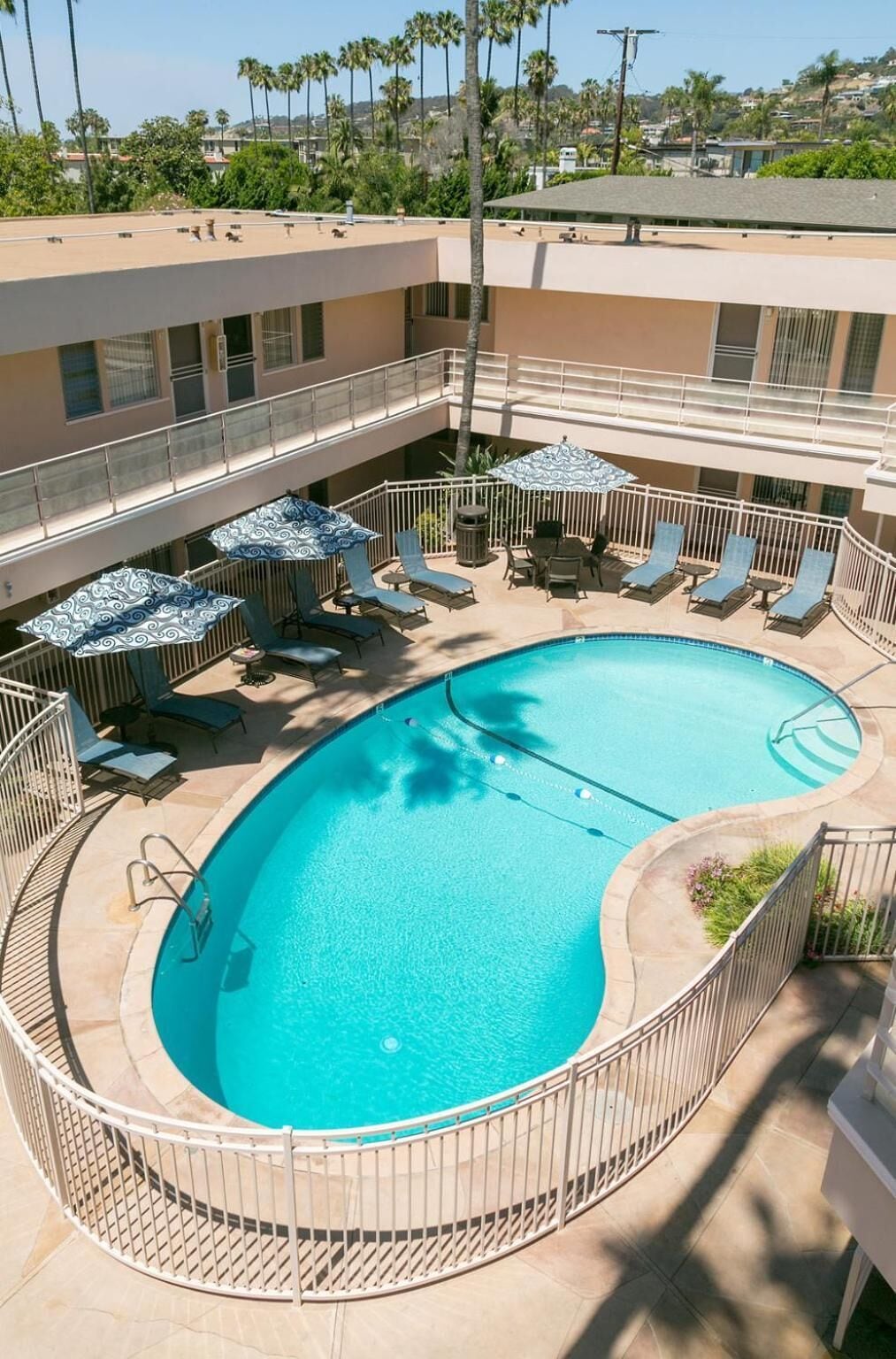 outdoor pool, pool umbrellas, pool loungers