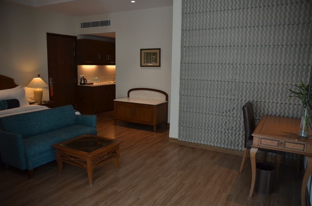 junior suite | 1 bedroom, in-room safe, desk, laptop workspace