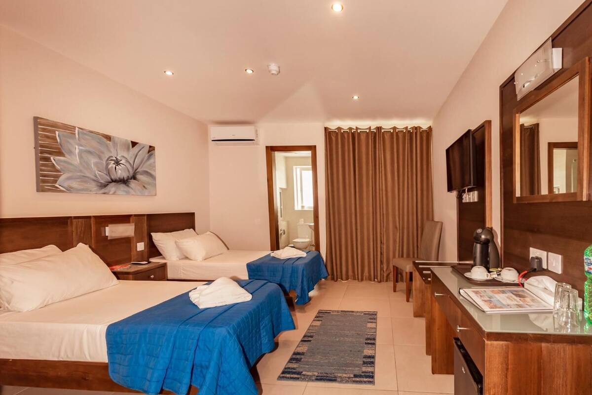 in-room safe, desk, blackout curtains, iron/ironing board