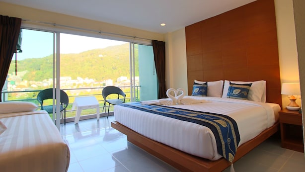 Premium Triple Room, Hill View | Minibar, in-room safe, desk, laptop workspace - Good Nice Hotel Patong (Patong)