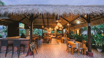 Breakfast, lunch, dinner served; Indonesian cuisine, pool views