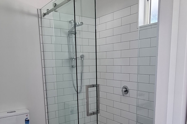 Shower, eco-friendly toiletries, hair dryer, towels