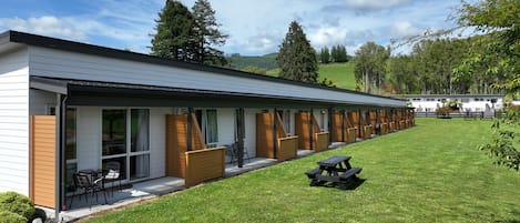 Deluxe Studio, Multiple Beds, Transfer Shower, Garden View | Terrace/patio