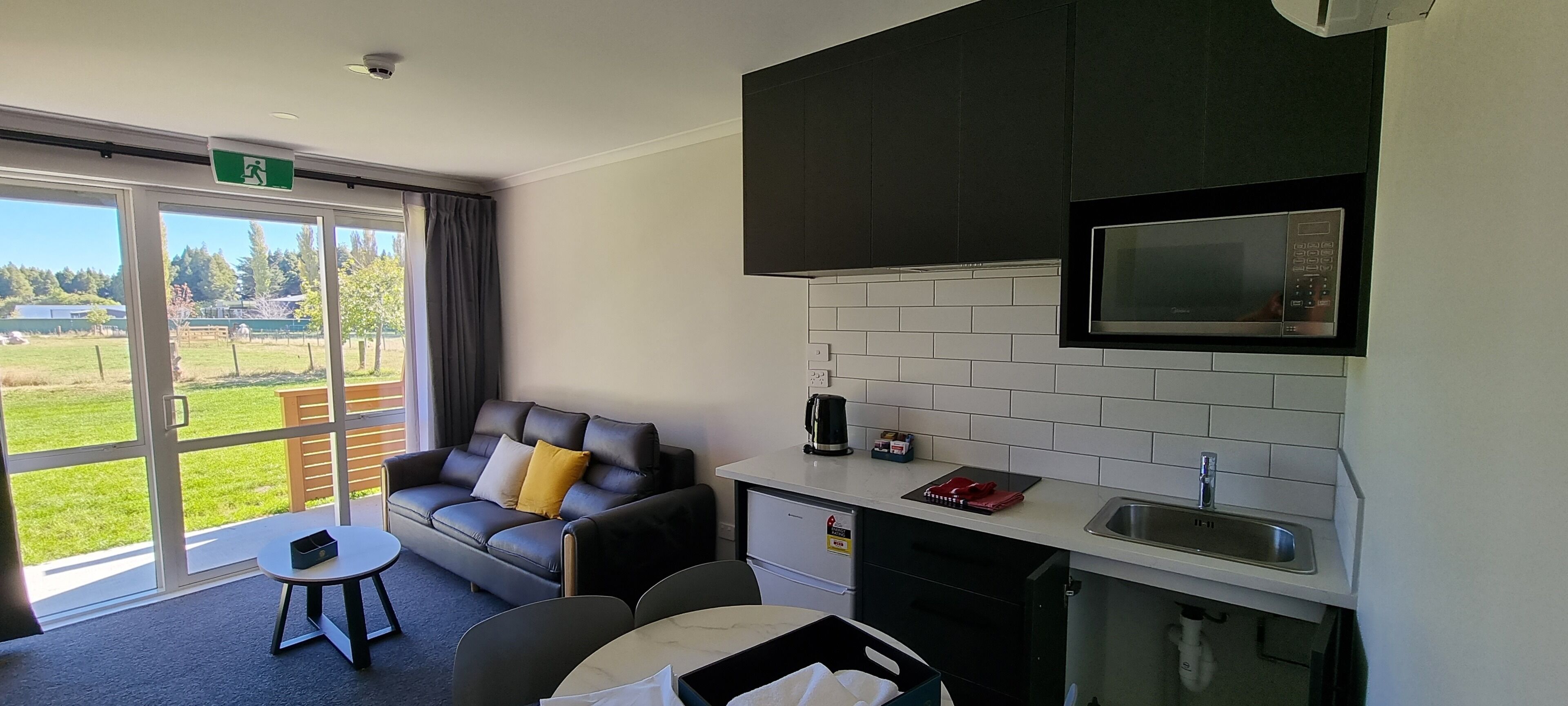 Deluxe Family Room with Spa Bath | In-room safe, desk, laptop workspace, soundproofing