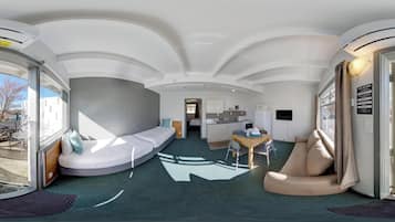 Family Room | Premium bedding, down comforters, in-room safe, individually furnished