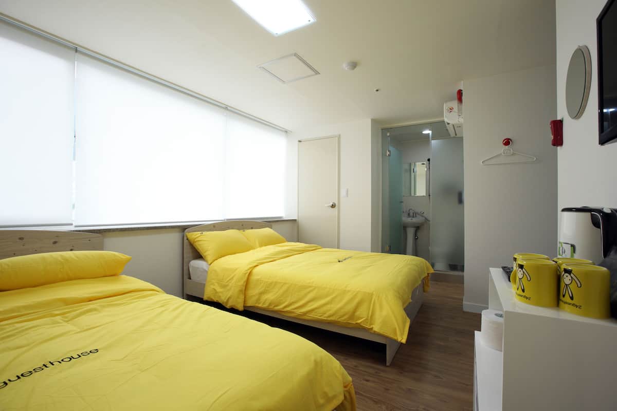Family Room | Down duvets, blackout curtains, soundproofing, free WiFi
