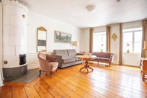 Superior Apartment, 1 Bedroom, City View | Living room | Flat-screen TV