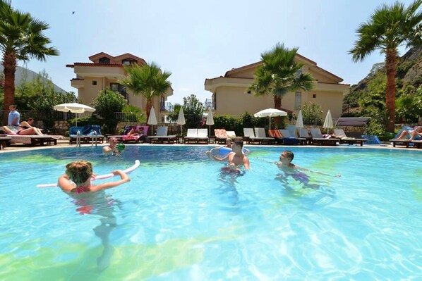 Seasonal outdoor pool, pool umbrellas, sun loungers