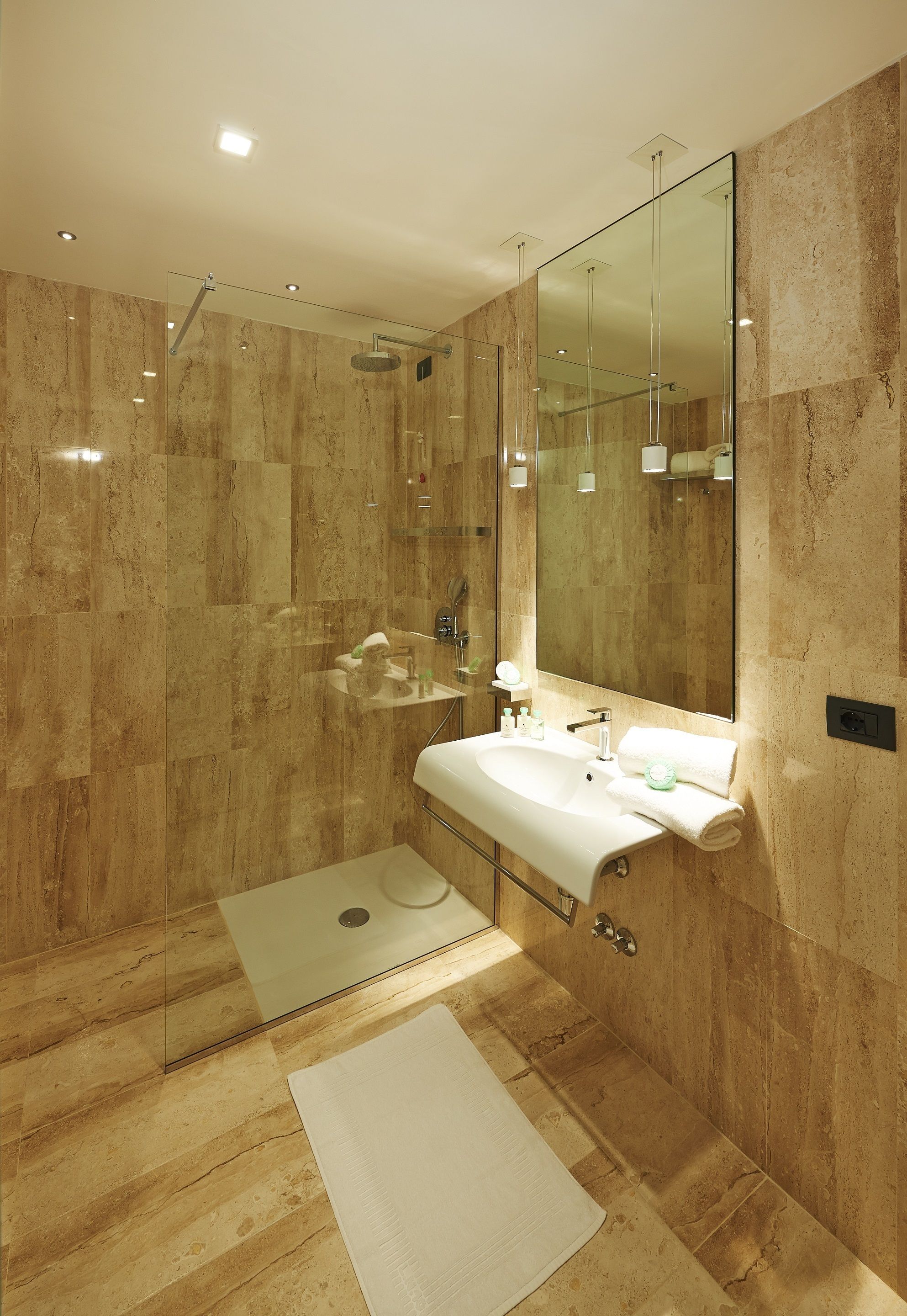 rainfall showerhead, hair dryer, bidet, towels