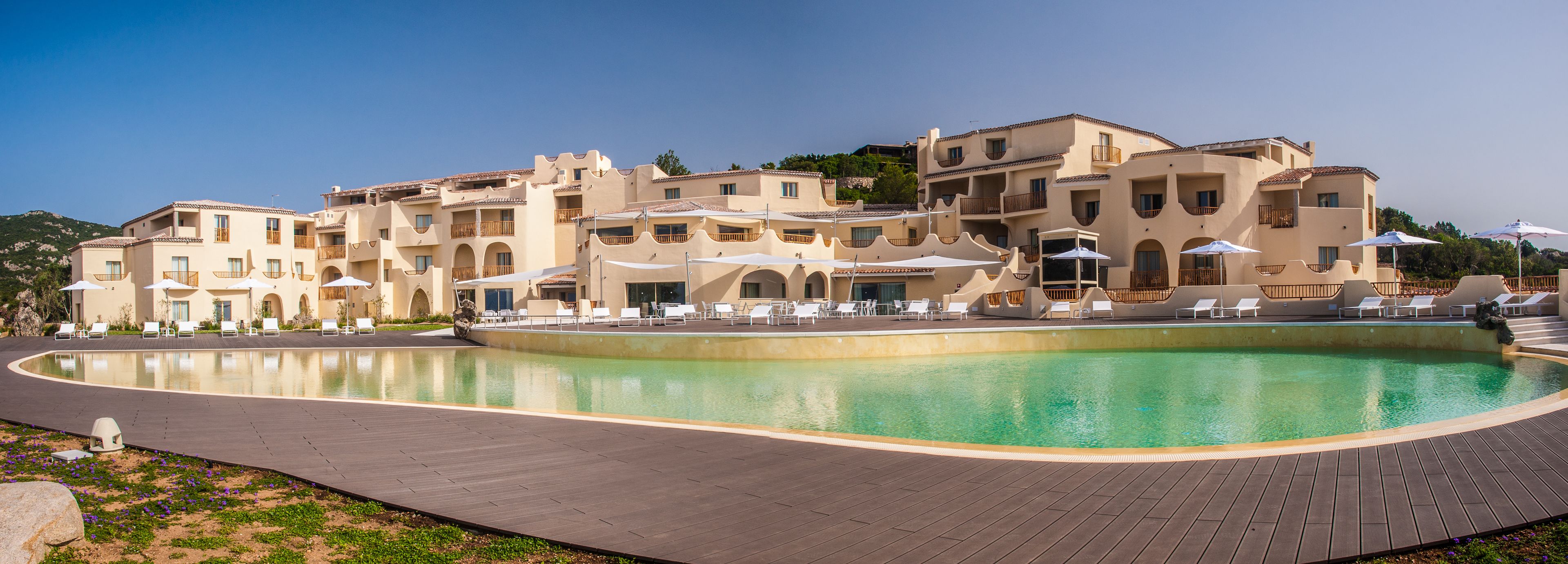 outdoor pool, pool umbrellas, pool loungers