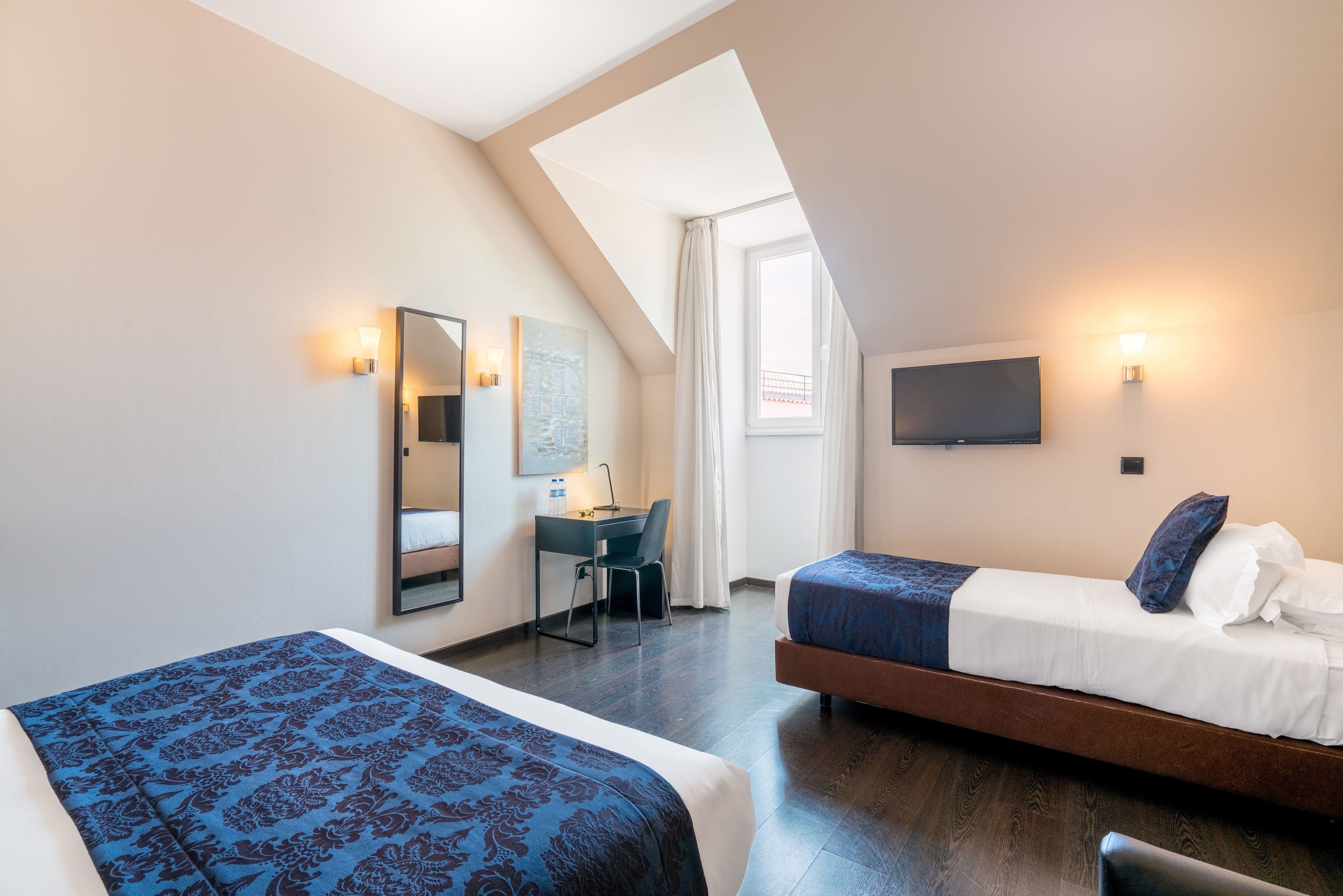 executive triple room | in-room safe, desk, blackout curtains, soundproofing