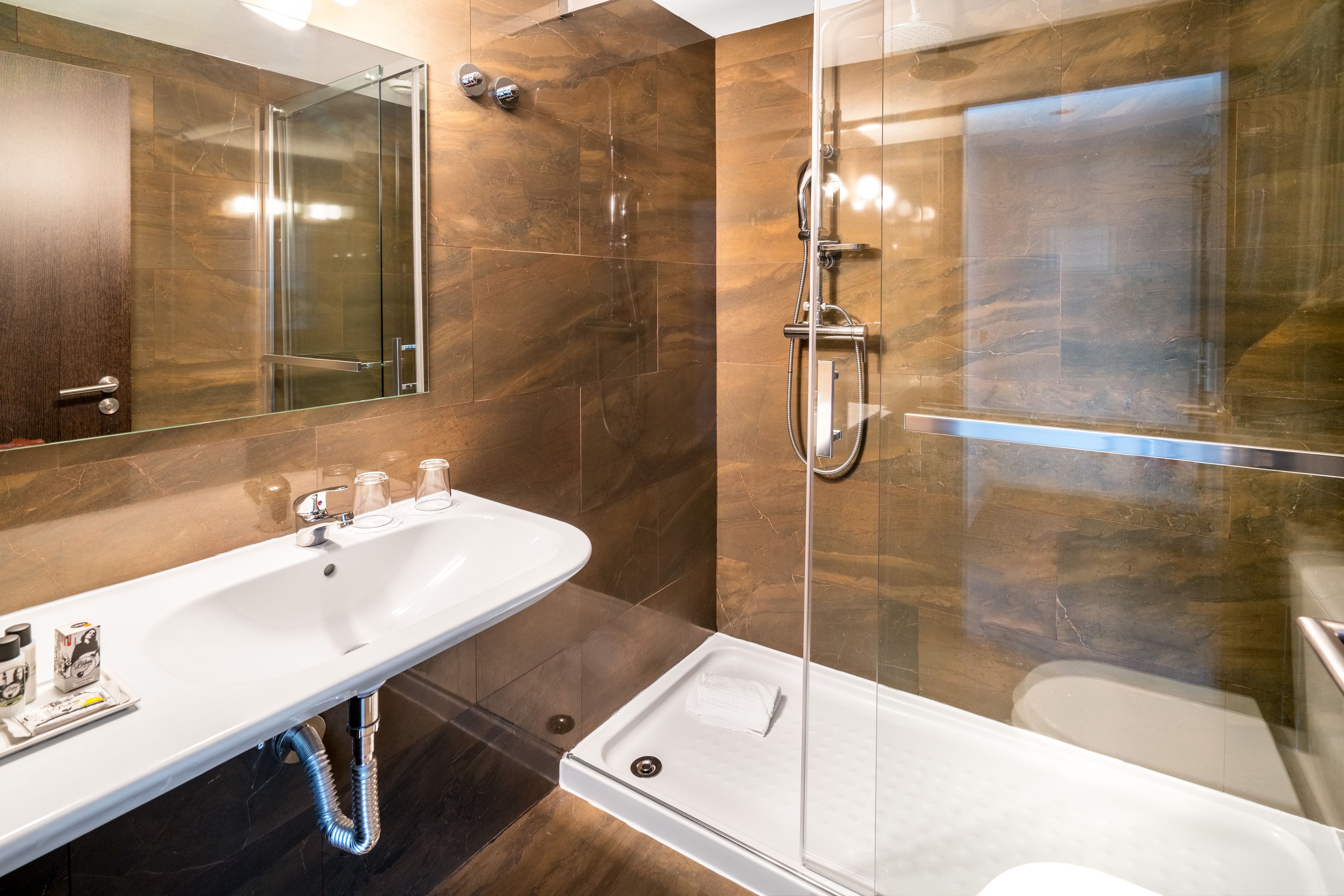 free toiletries, hair dryer, bidet, towels