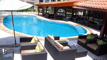 Outdoor pool, pool umbrellas, sun loungers