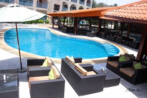 Outdoor pool, pool umbrellas, pool loungers