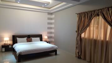 Suite ejecutiva | Sábanas de algodón egipcio, camas Tempur-Pedic y minibar