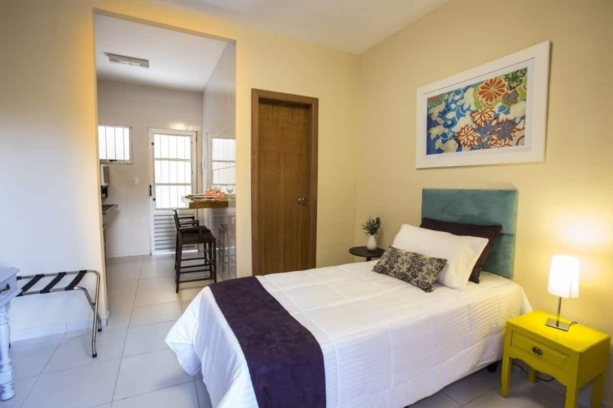 Single Room (Villa Single) | Minibar, in-room safe, iron/ironing board (on request), WiFi (free)